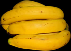 Ripe Yellow Bananas Black Background PNG image with transparent background