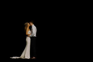 Romantic Couple Intimate Moment Dark Background.jpg PNG image with transparent background