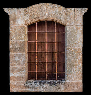 Rustic Arched Stone Windowwith Iron Bars PNG image with transparent background