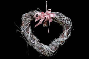 Rustic Twig Heartwith Bow PNG image with transparent background