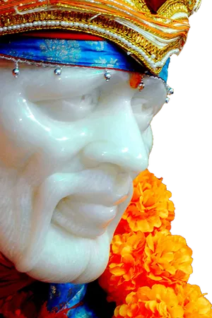 Sai Baba Statue Profilewith Orange Flowers PNG Image