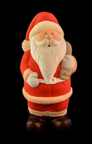 Santa Claus Figurine Black Background PNG with transparent background