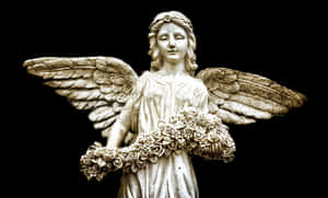 Serene Angel Statuewith Roses PNG image with transparent background