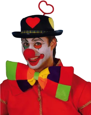 Smiling Clownwith Red Noseand Colorful Attire PNG Image