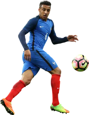 Soccer_ Player_in_ Blue_ Kit_ Action_ Shot PNG Image