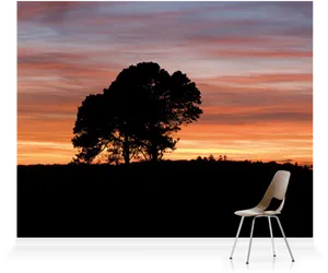 Solitary_ Chair_ Under_ Sunset_ Sky PNG Image