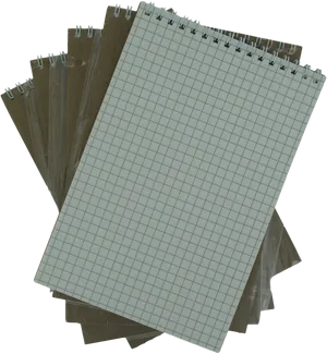 Spiral Notebookon Graph Paper Background PNG Image