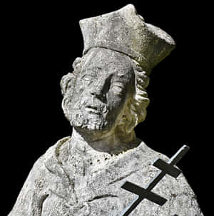 Stone Statueof Religious Figurewith Cross PNG image with transparent background