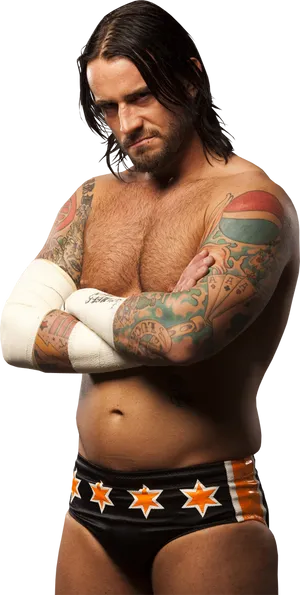 Tattooed_ Wrestler_ Posing PNG Image