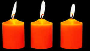 Three Lit Orange Candles PNG image with transparent background