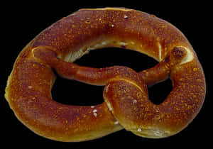 Traditional Baked Pretzelon Black Background.jpg PNG with transparent background