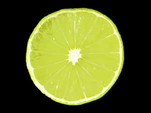 Vibrant Lime Slice Black Background PNG with transparent background