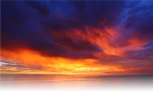 Vivid_ Sunset_ Over_ Ocean PNG Image