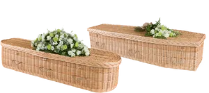 Wicker Coffinswith Floral Arrangements PNG Image