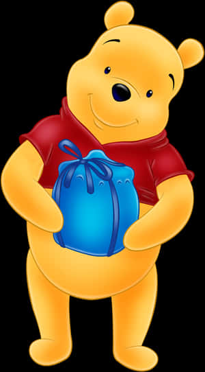 Winnie The Pooh Holding Present PNG image with transparent background