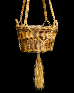 Woven Basketwith Tasselon Black Background.jpg PNG image with transparent background