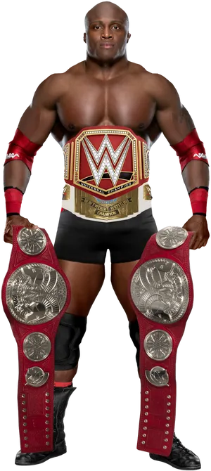 Wrestling_ Champion_ Posing_ With_ Belts PNG Image