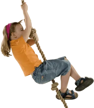 Young Girl Climbing Rope Adventure PNG Image